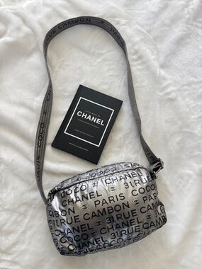 Authentic CHANEL Metallic Silver Logo Quilted Crossbody Bag